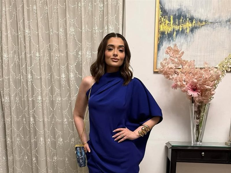 ملك أحمد زاهر تتألق بالأزرق من توقيع  MOONMAINS في فعالية she can 