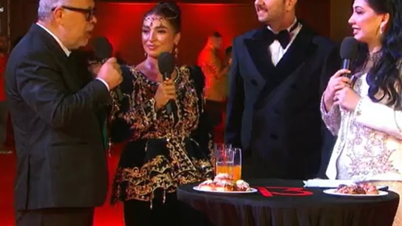 أشرف زكي وروجينا