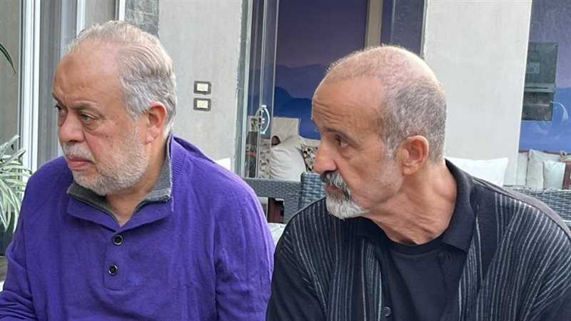 أشرف زكي وأيمن عزب