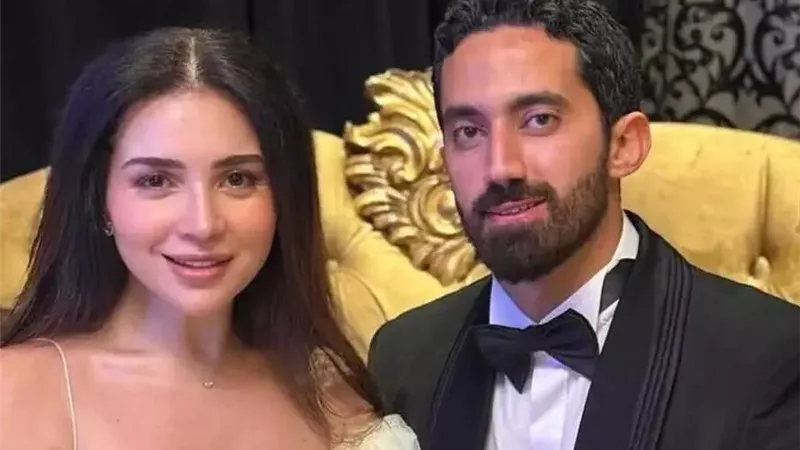 مي عز الدين وزوجها
