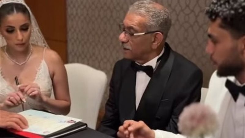 سيدر رجب برفقة ابنه