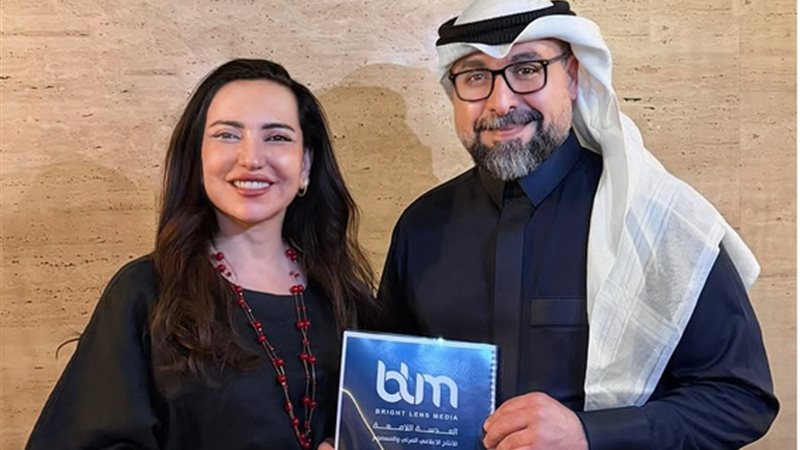 أمل عرفة والمنتج